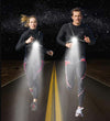 Running Light Vest used by 2 runners on the street illuminating road